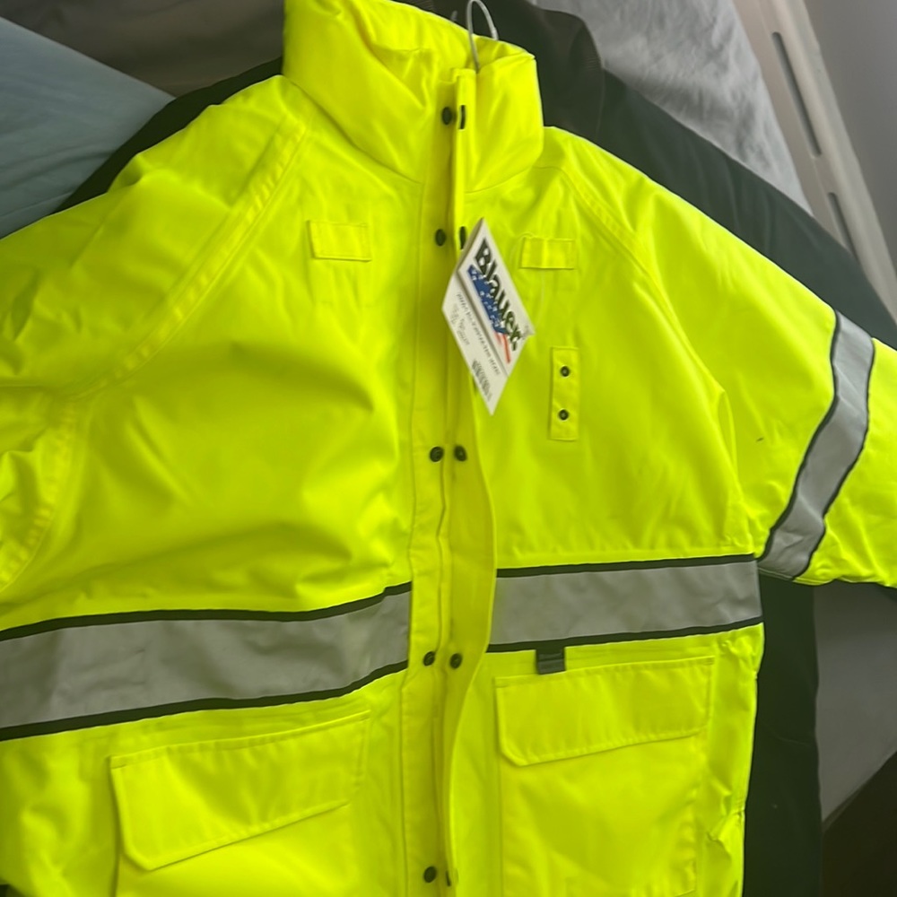 Blouer rain  jacket; never used tag on.